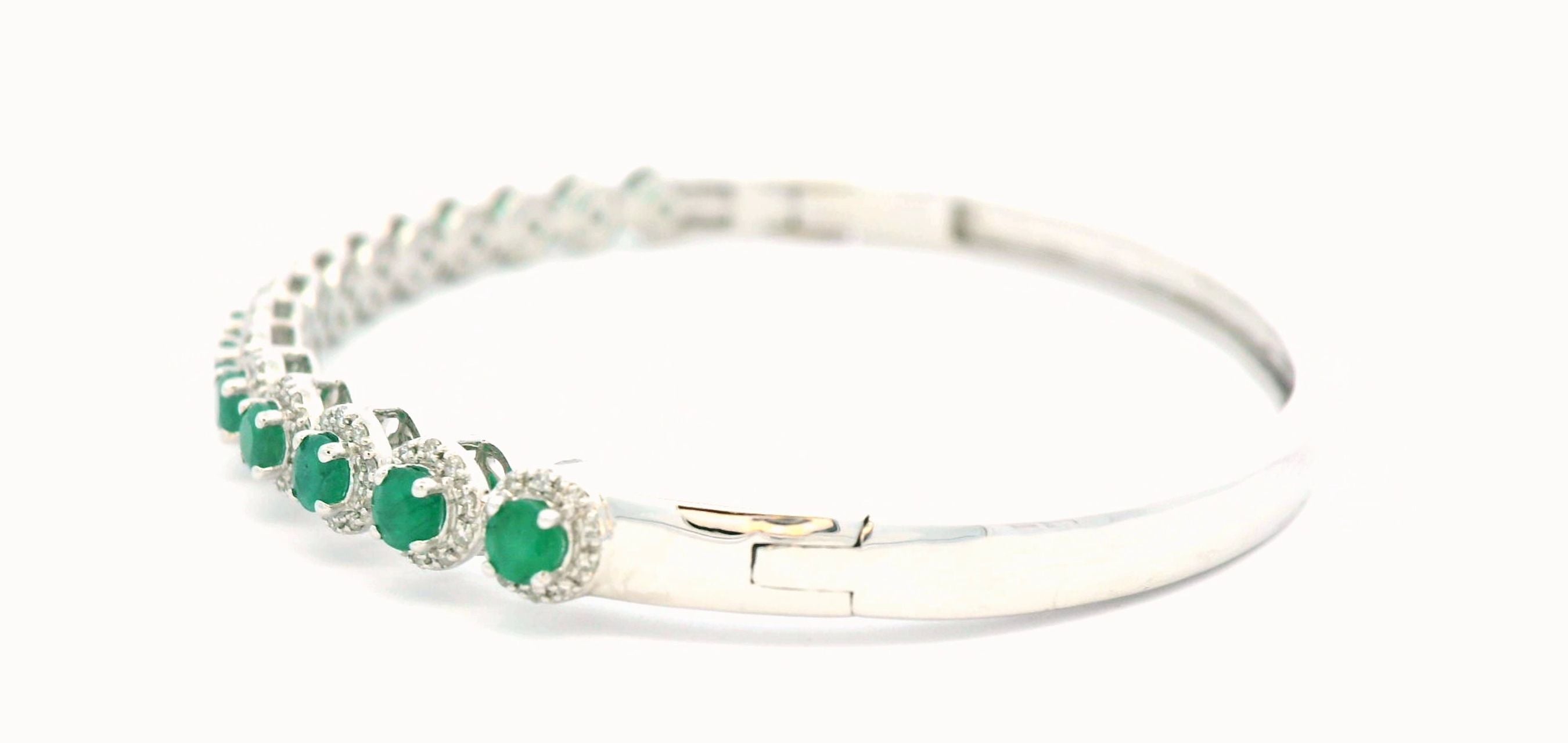 BRACELET 14KW 0.45CTW DIAMOND & EMERALD OVAL BANGLE- 1.60CT EMERALD - W/ DIAM HALO