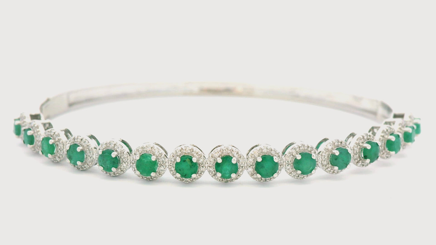 BRACELET 14KW 0.45CTW DIAMOND & EMERALD OVAL BANGLE- 1.60CT EMERALD - W/ DIAM HALO